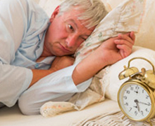 man having trouble sleeping man having trouble sleeping