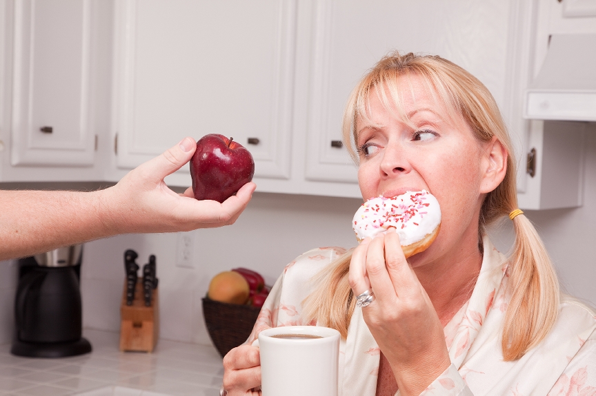 woman eating donut